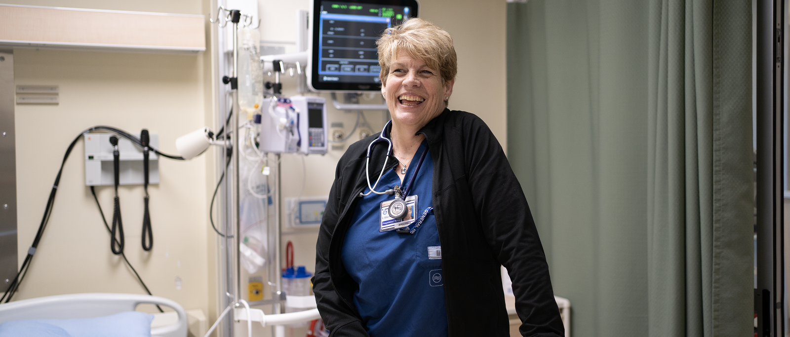 Nursing Graduate at bedside